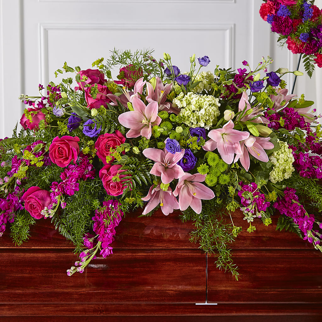 Radiant Tribute Casket Spray – Rambling Rose Florist, Dunedin FL
